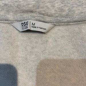 Selling cropped grey zip up jacket, size Medium, brand is DSG